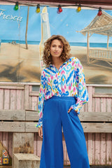 https://cdn.shopify.com/s/files/1/1007/1746/1833/files/24050-Tribal-Print-Blouse-White-Muticolour-8.webp?v=1775409522
