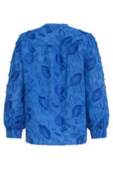 https://cdn.shopify.com/s/files/1/1007/1746/1833/files/25138-Cobalt-3D-Bloemen-Blouse-Cobalt-7.webp?v=1775404199