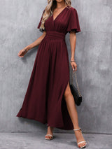 Eterna - Vestido Largo Elegante en Negro con Escote en V Manga Transparente y Abertura