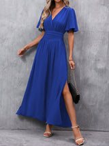 Eterna - Vestido Largo Elegante en Negro con Escote en V Manga Transparente y Abertura