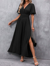Eterna - Vestido Largo Elegante en Negro con Escote en V Manga Transparente y Abertura