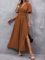 Eterna - Vestido Largo Elegante en Negro con Escote en V Manga Transparente y Abertura