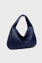 https://cdn.shopify.com/s/files/1/0925/6445/5798/files/Soera-WovenXL-bag-21-Photoroom_357707da-069b-4c3e-932c-adcfd3bee1bd.png?v=1757441379