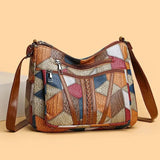 https://cdn.shopify.com/s/files/1/0925/6445/5798/files/Solara_mozaiek_leren_handtas_1.jpg?v=1759950635