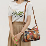 https://cdn.shopify.com/s/files/1/0925/6445/5798/files/Solara_mozaiek_leren_handtas_6.jpg?v=1759950635