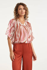 https://cdn.shopify.com/s/files/1/1007/1746/1833/files/imgi_54_Wijde-Top-Met-Roze-Zebra-Style-Print-Brique-Old-Pink-4.jpg?v=1775566303